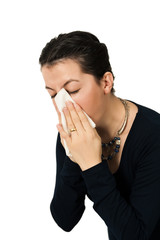 Isolated sneezing flu sick young girl on white background