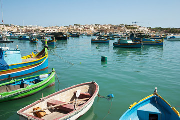 Colorful traditional fishing boats in the island of Malta