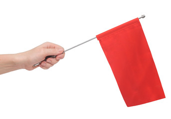 Hand holding a red flag isolated on white background. Put your o