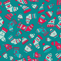 Winter seamless pattern with socks, mittens and hats