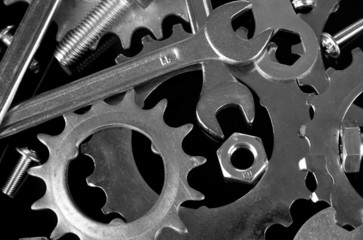 Machine gear, metal cogwheels, nuts and bolts background,