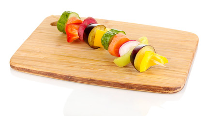 Sliced vegetables on wooden pick isolated on white