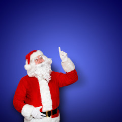 Fototapeta na wymiar Santa na niebieskim tle