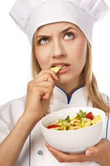 Positive young chef in the studio