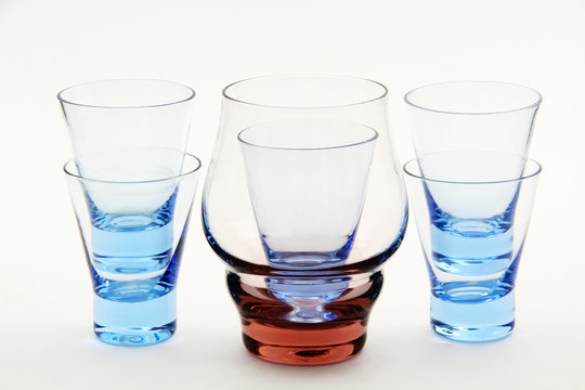 small colored glass and a large glass.