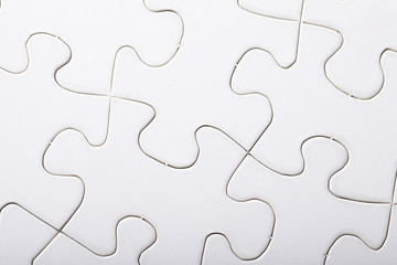 Jigsaw puzzle with blank white pieces