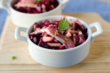 Beetroot salad , herring and apples with honey-mustard dressing