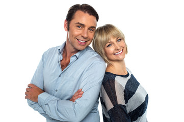 Attractive love couple striking stylish pose