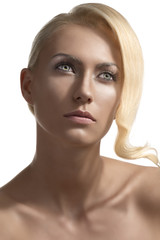 beauty portrait of blonde girl looks up