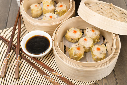 Siu Mai - Chinese pork and shrimp dumplings in bamboo steamers