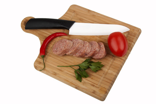 Sausage on kitchen board