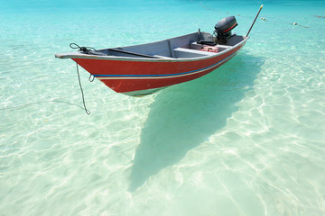 Beautiful beach with motor boat