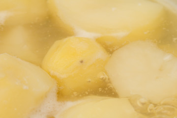 potatoes cooked in the background. macro