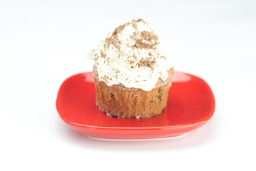 muffin with whipped cream and nuts