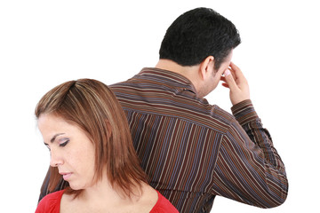 Young couple standing back to back having relationship difficult