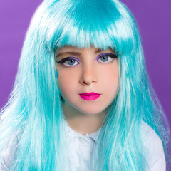 Fototapeta premium Children girl with blue truquoise long wig as fashiondoll
