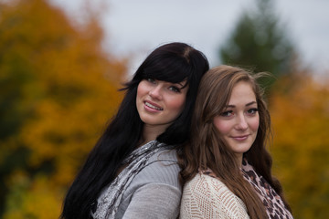 Beautiful elegant young women and autumn colors.