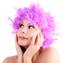 young woman with purple wig from feathers, isolated