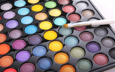 colorful eyeshadow palette and brush, makeup