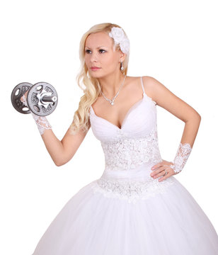 beautiful bride with dumbbell isolated on white