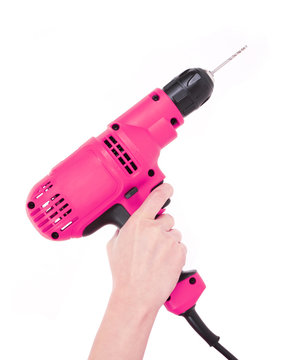 hot pink drill in hand isolated on white