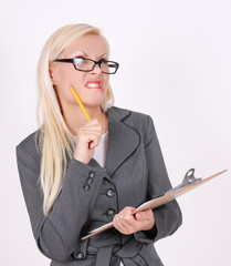 angry secretary in glasses with pen and clipboard