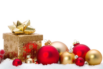 Decorative Christmas glass ornaments on the snow