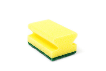 A kitchen sponge isolated against white background