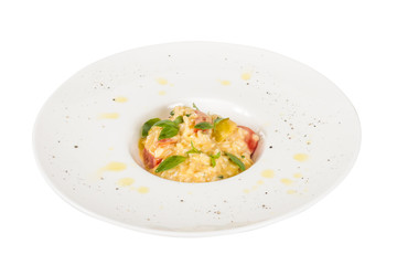 photo of delicious risotto dish with herbs and tomato on white b