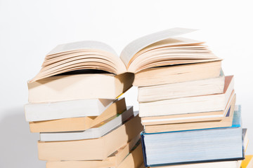 pile of books on white background