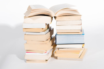 pile of books on white background