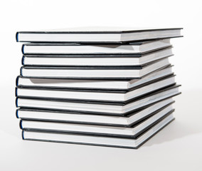 pile of books on white background
