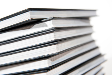 pile of books on white background