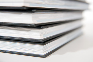 pile of books on white background