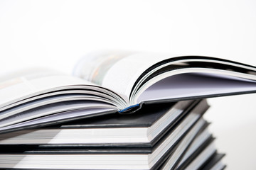 pile of books on white background