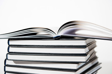pile of books on white background