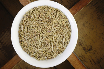 Dried Rosemary in white dish