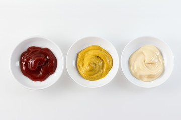 Ketchup, mustard, and mayonnaise