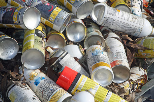 empty spray cans used in an industry