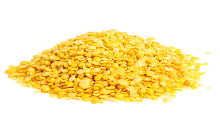 Yellow lentils isolated on white background. Macro shot
