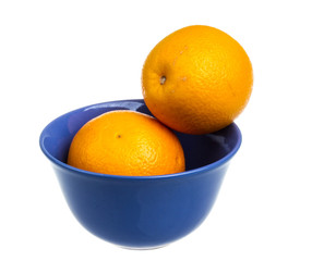Heap of oranges in the dish