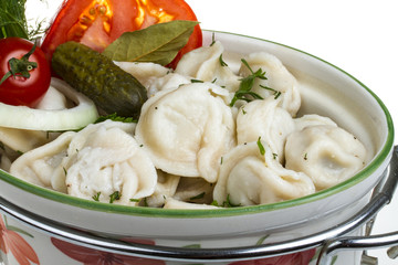 Bowl with traditional russian dish - pelmeni