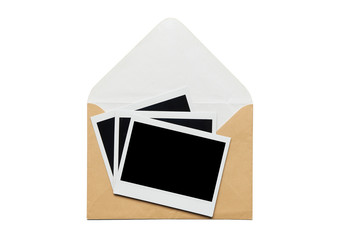 instant photo and open envelope. grey and old letter isolated o