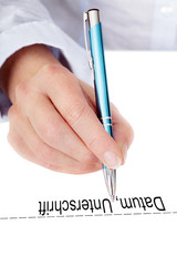 Hand holding pen