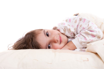 Obraz na płótnie Canvas Słodki szczęśliwa mała dziewczynka spania