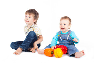 children playing with pepper in studio