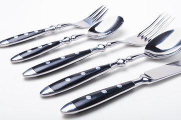 Set of flatware on white background
