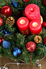 Beautiful Christmas wreath on wooden table close-up
