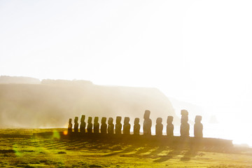 Fifteen standing moai at sunrise in Easter Island