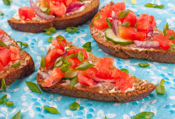 Sandwich with white sauce and vegetables